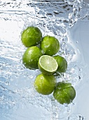 Limes, whole & halved, in water