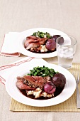 Beef in balsamic vinegar sauce with caramelised red onions