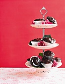 Chocolate-raspberry cupcakes on a whatnot