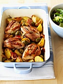 Chicken with garlic potatoes, olives and rosemary