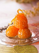 Clementines with honey, icing sugar and thyme