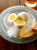 Pickled eggs with salt and bread in an English pub
