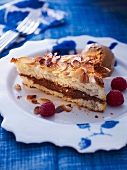A panini filled with chocolate spread, almonds and raspberries