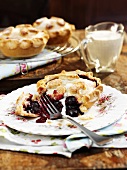 Raspberry and blueberry pie with cream