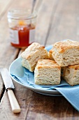 Cream Cheese Biscuits on a Plate; Jar of Jam