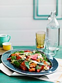 Salmon salad with preserved watermelon