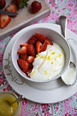 Bowl of Lemon Curd Yogurt with Fresh Strawberries
