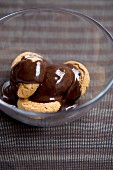 Amaretti Cookies with Chocolate Sauce in a Bowl