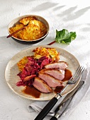 Roast duck with rhubarb-red cabbage and hash browns