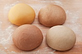 Various types of pasta dough (made from corn flour, wholemeal flour, chestnut flour and buckwheat flour)