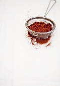 Cocoa powder in a sieve