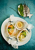 Fish fillets with vegetables in parchment paper
