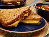 Halved Grilled Cheese Sandwich with Soup
