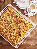 Apricot crumble cake in a baking tray