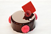 Chocolate cake with raspberries and macaroons