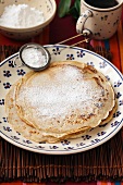 Wholemeal pancake with icing sugar