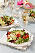 Courgette salad with cherry peppers, pine nuts and rocket