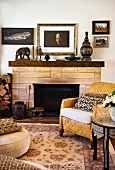 Sitting room with fireplace and antique sculptures on the mantlepiece