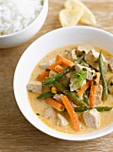 Thai curry with chicken and a side of rice