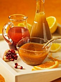Various dressings with pomegranate and oranges