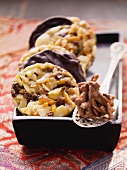 Chocolate almond brittle and florentines with dried fruits