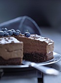 Chocolate cream cake with blueberries