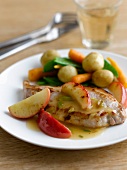 Pork chops with vegetables and apples