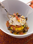 Monk fish on a bed of Mediterranean vegetables