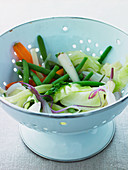Mixed vegetables in a colander