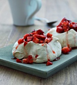 Meringues topped with strawberries (Scandinavia)