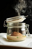 Smokes Scallop on a Bed of Mustard Cream Sauce in a Canning Jar with Applewood Smoke