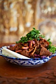 Thai Beef Salad with Cilantro and Onions in a Spicy Sauce