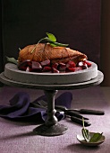 Goose breast on a bed of beetroot