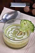 Cream of broccoli soup with broccoli on a stick