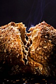 Steaming wholemeal bread, broken in half