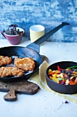 Breaded veal escalopes with stir-fried vegetables