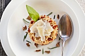 Tessine rice risotto with dried tomatoes, herbs, porcini mushrooms and Parmesan cheese