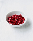 A bowl of red peppercorns