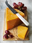 Applebys Double Gloucester cheese with crackers and grapes