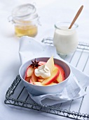 Poached apple slices with creme fraiche