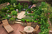 View down onto terrace with different flooring materials separated by steps