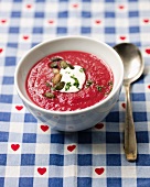 Beetroot soup with pumpkin seeds and sour cream