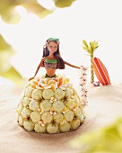 A Barbie cake with coconut balls