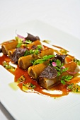 Potato Wrapped Cannelloni with Braised Beef Filling, Red Wine Sauce and Truffle Mushrooms