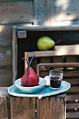 Red wine pears with a vanilla pod