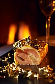 Mandarin roulade with quinces, dates and gold leaf