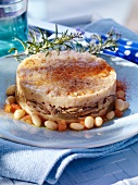 Lamb and coconut cake with tomatoes and beans (Brittany)