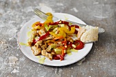 Chicken with stir-fried vegetables and white bread