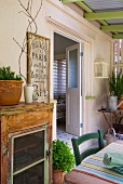 Seating area in loggia of rustic country house