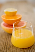 Citrus fruit juice in a glass jug